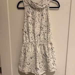 White, black speckled romper